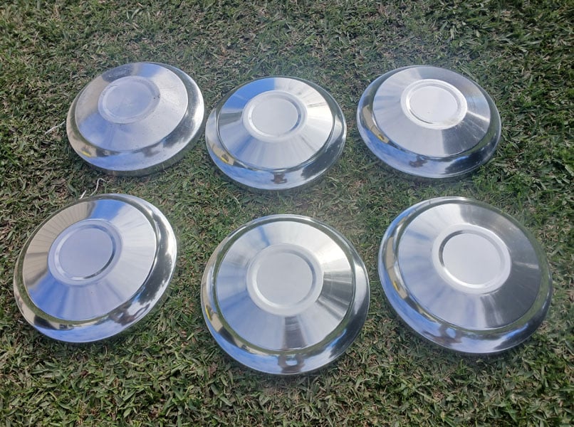 Austin Tasman hub cap set